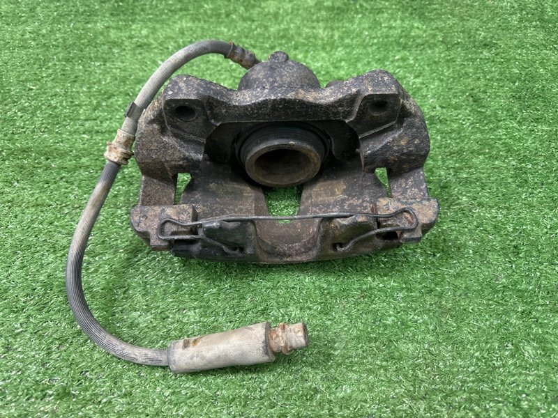 Суппорт тормозной Opel Astra H