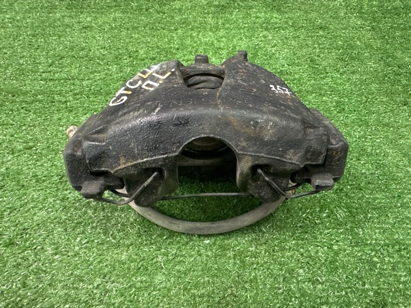 Суппорт тормозной Opel Astra H