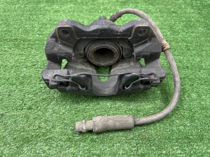 Суппорт тормозной Opel Astra H