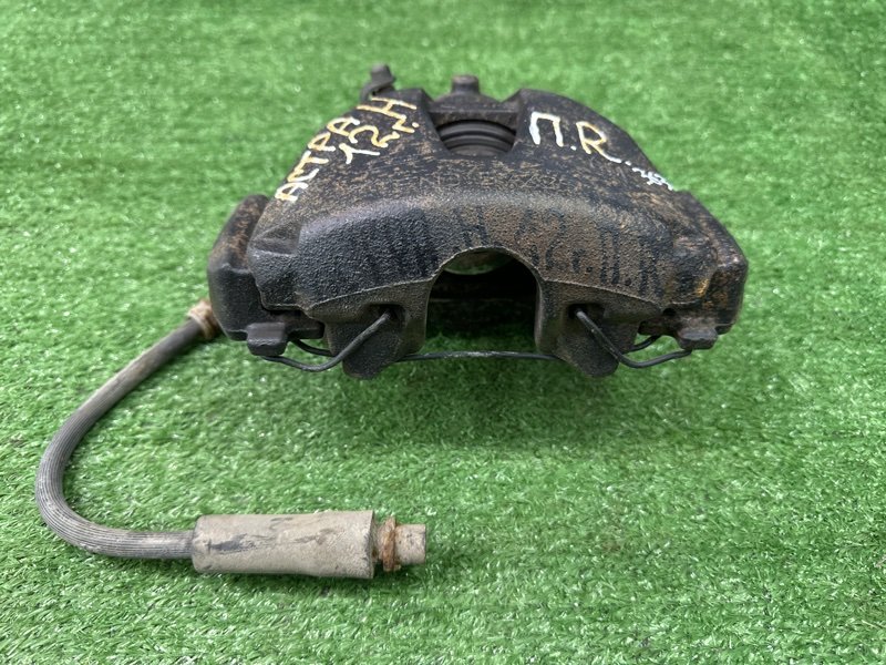 Суппорт тормозной Opel Astra H