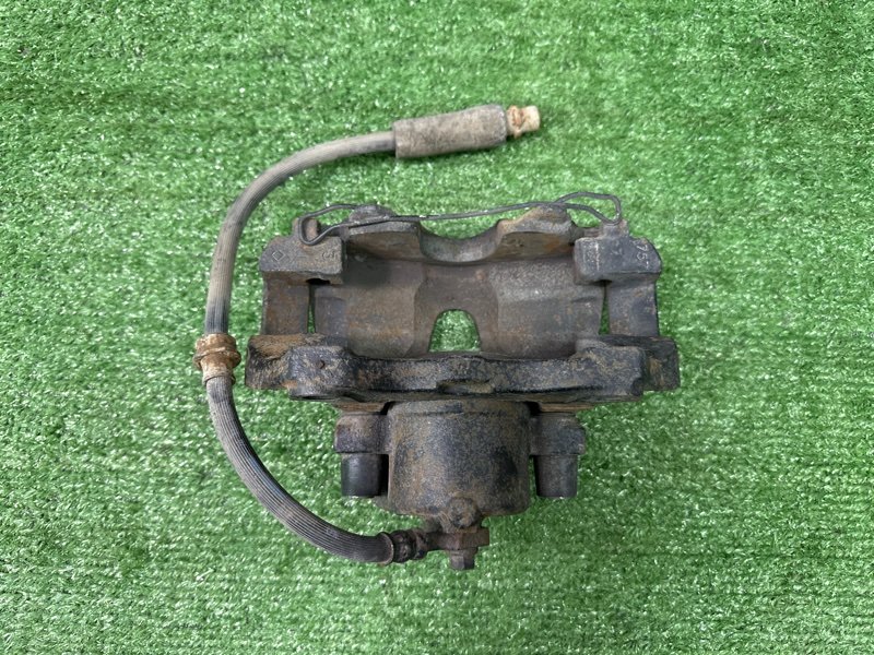 Суппорт тормозной Opel Astra H