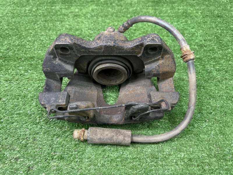 Суппорт тормозной Opel Astra H