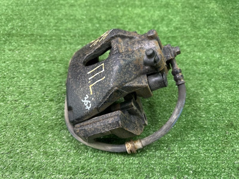 Суппорт тормозной Opel Astra H