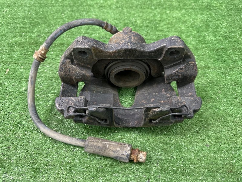 Суппорт тормозной Opel Astra H