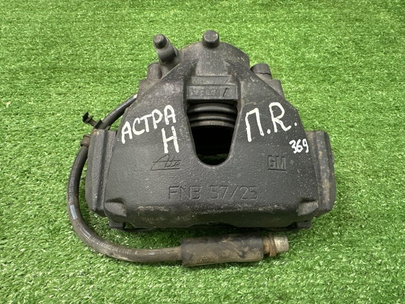 Суппорт тормозной Opel Astra H