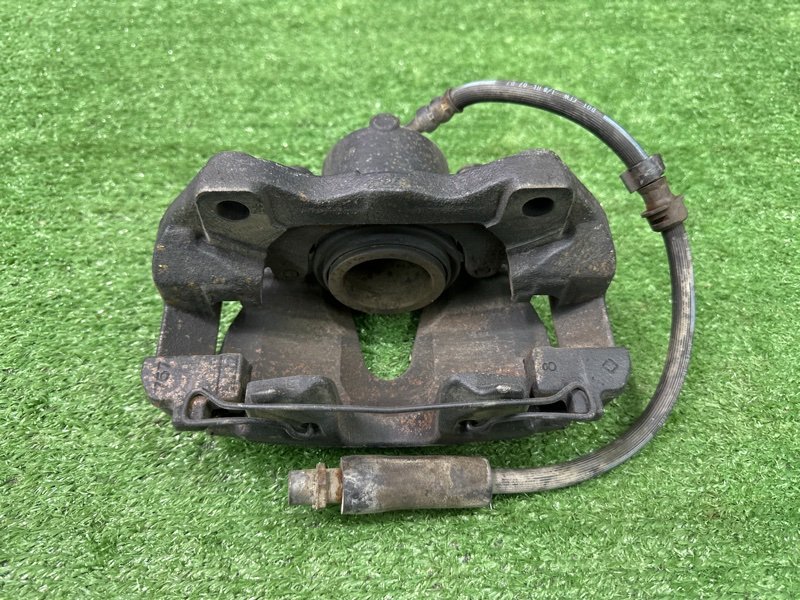 Суппорт тормозной Opel Astra H