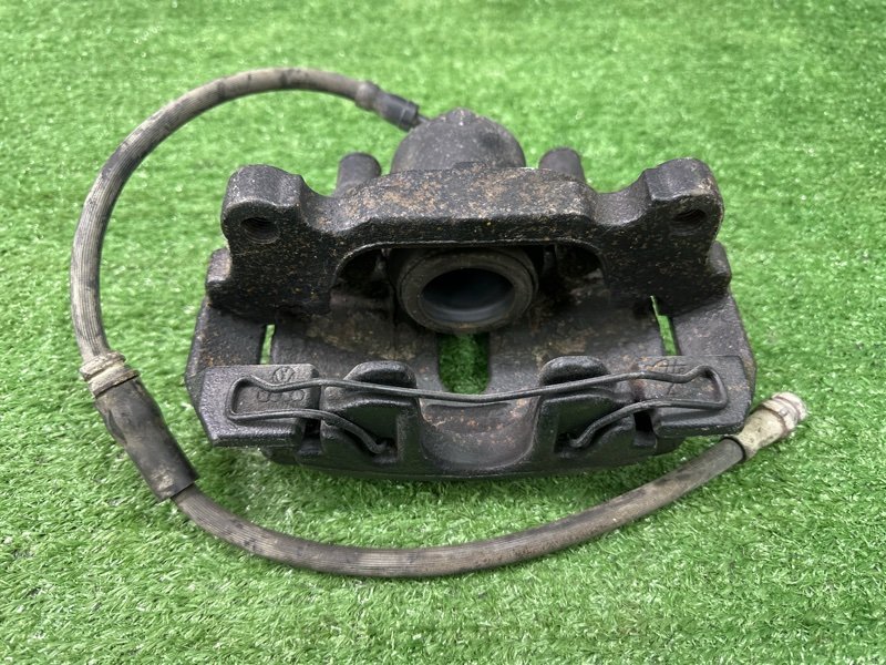 Суппорт тормозной Skoda Octavia A5