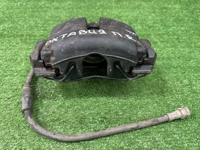 Суппорт тормозной Skoda Octavia A5