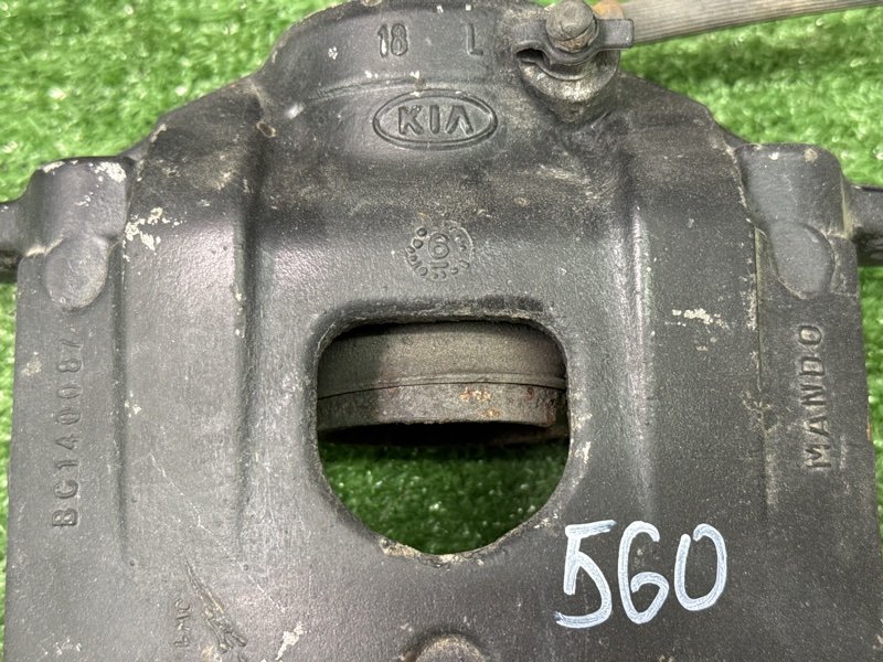 Суппорт тормозной Kia Cerato 1