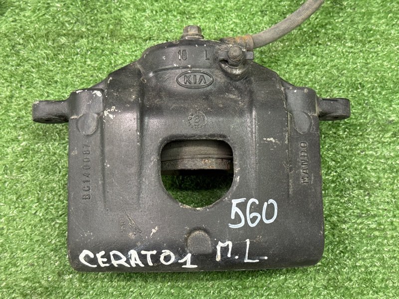 Суппорт тормозной Kia Cerato 1