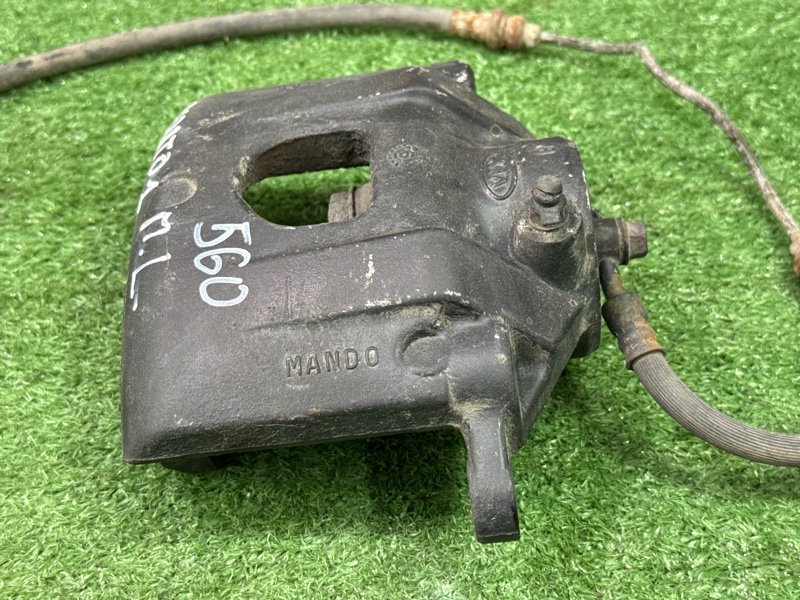 Суппорт тормозной Kia Cerato 1