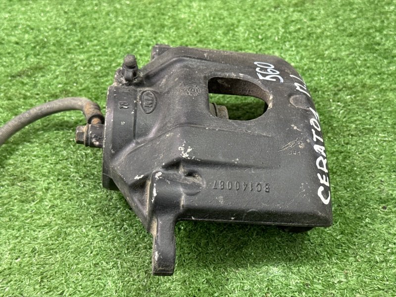 Суппорт тормозной Kia Cerato 1