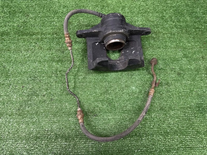 Суппорт тормозной Kia Cerato 1