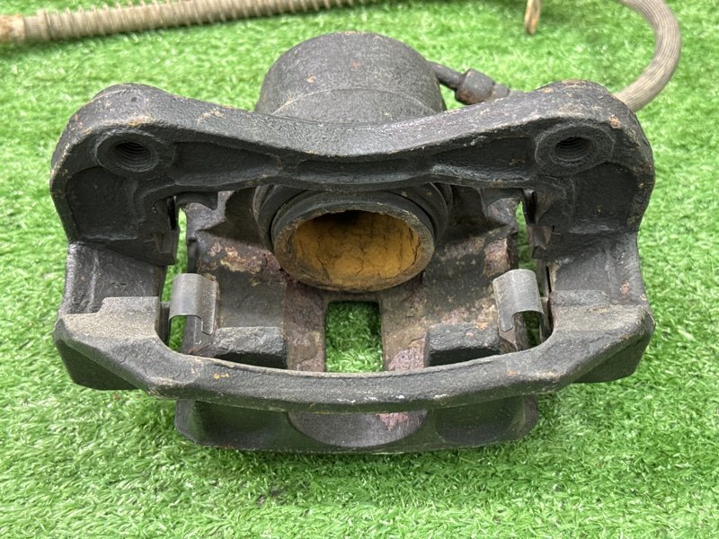 Суппорт тормозной Kia Rio 2