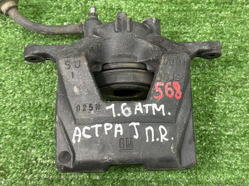 Суппорт тормозной Opel Astra J