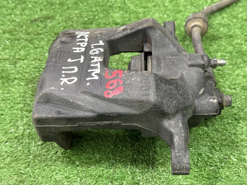 Суппорт тормозной Opel Astra J