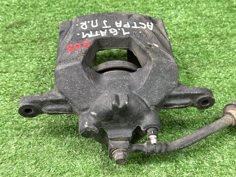 Суппорт тормозной Opel Astra J