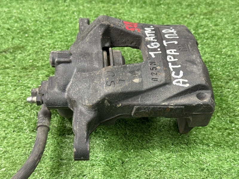 Суппорт тормозной Opel Astra J