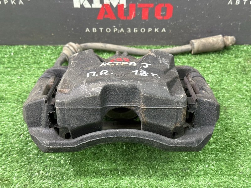 Суппорт тормозной Opel Astra J