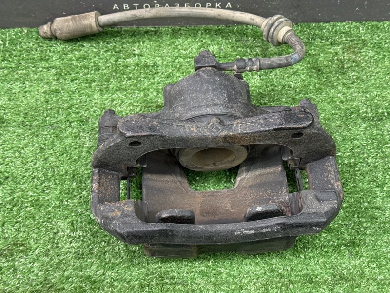 Суппорт тормозной Opel Astra J