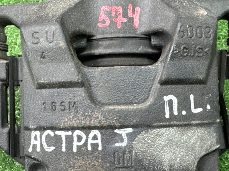 Суппорт тормозной Opel Astra J