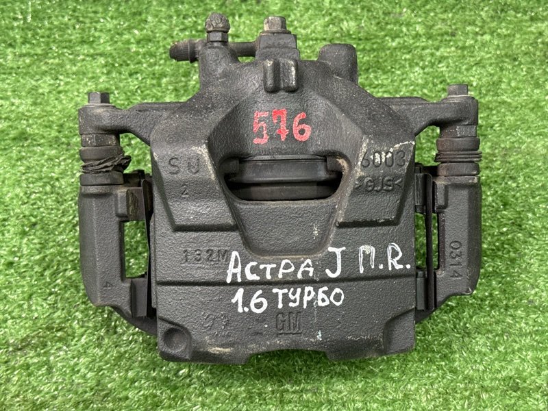 Суппорт тормозной Opel Astra J