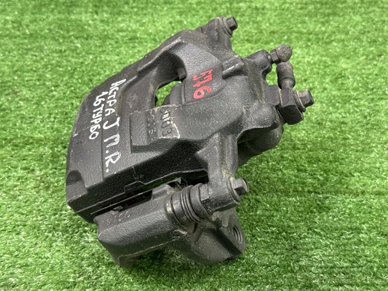 Суппорт тормозной Opel Astra J