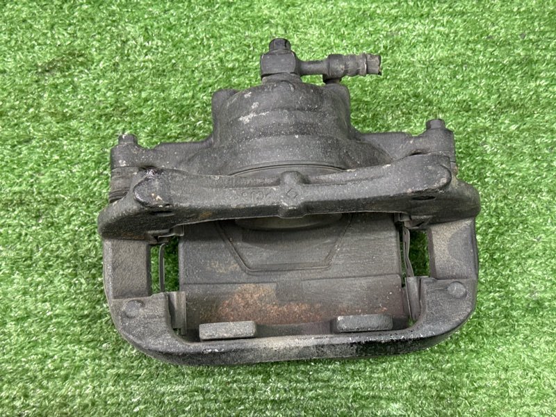 Суппорт тормозной Opel Astra J