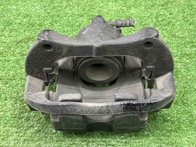 Суппорт тормозной Opel Astra J