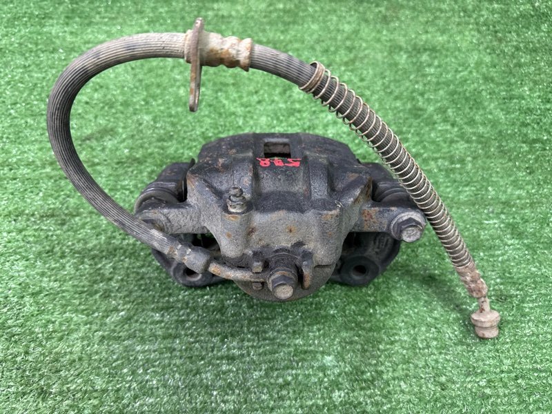 Суппорт тормозной Kia Rio 2