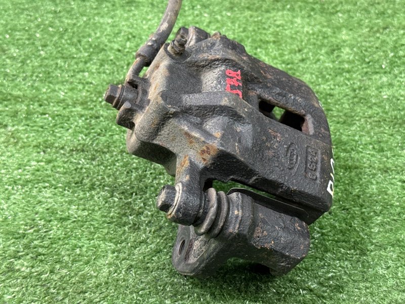 Суппорт тормозной Kia Rio 2