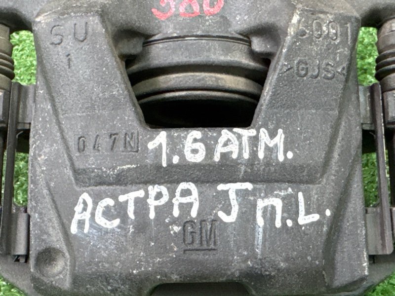 Суппорт тормозной Opel Astra J