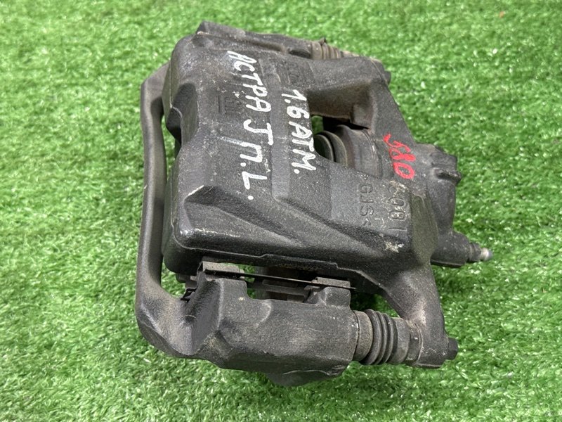 Суппорт тормозной Opel Astra J