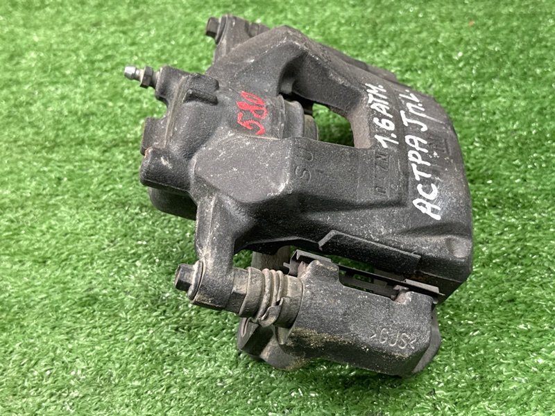 Суппорт тормозной Opel Astra J