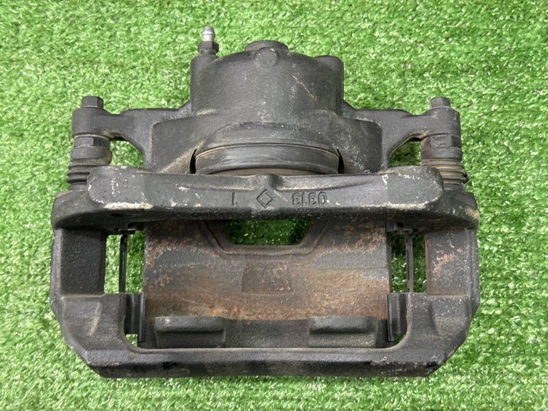 Суппорт тормозной Opel Astra J