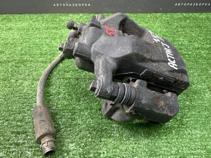 Суппорт тормозной Opel Astra J