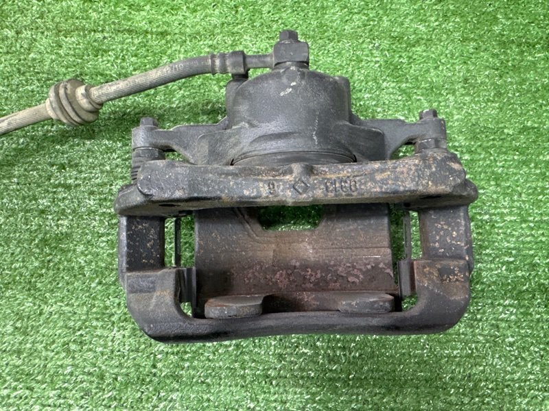 Суппорт тормозной Opel Astra J