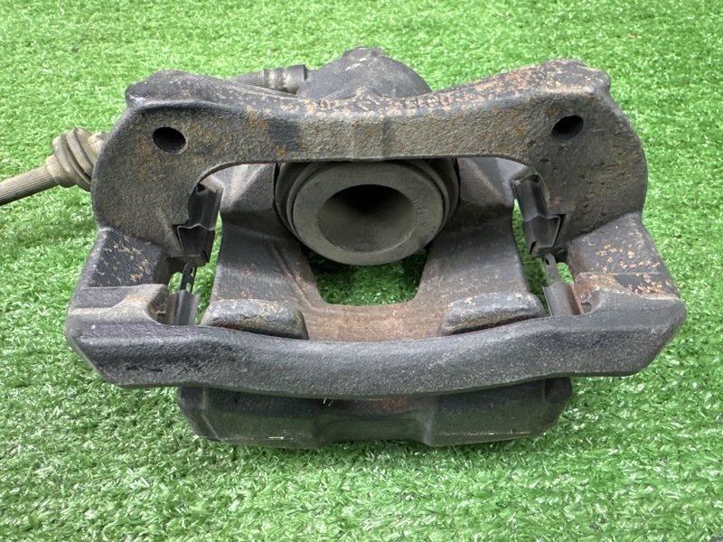 Суппорт тормозной Opel Astra J