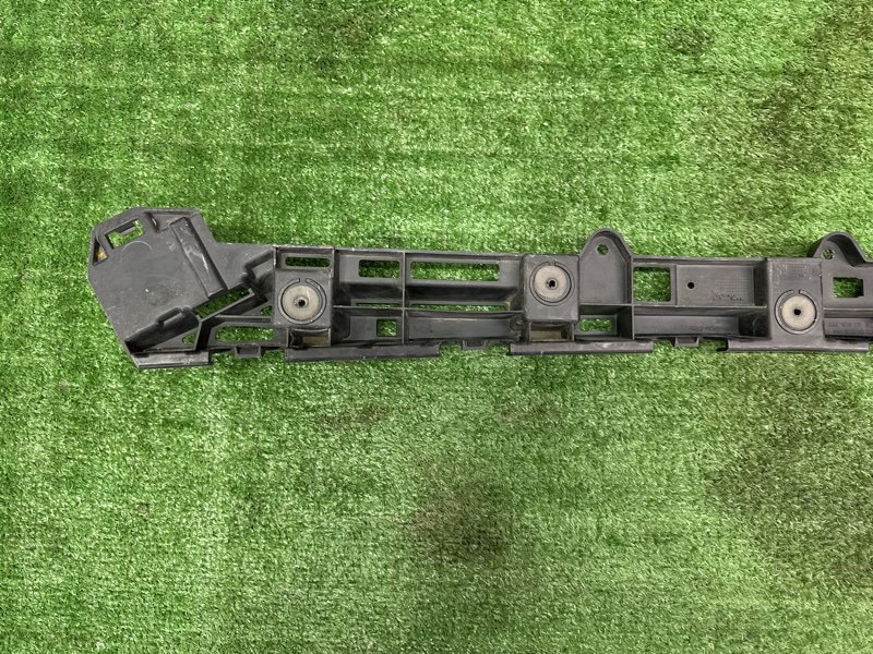 Кронштейн заднего бампера центральный Opel Astra