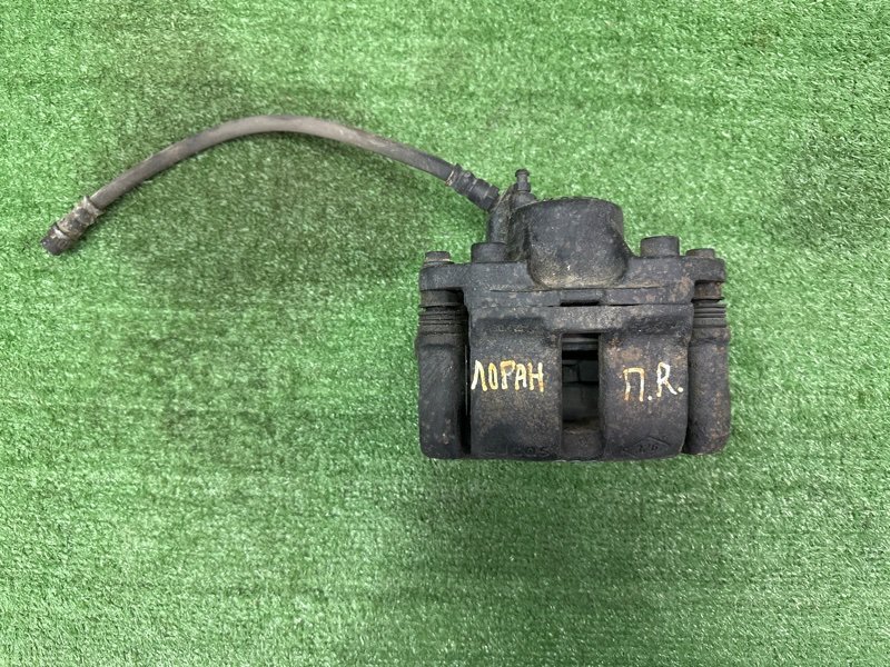 Суппорт тормозной Renault Logan