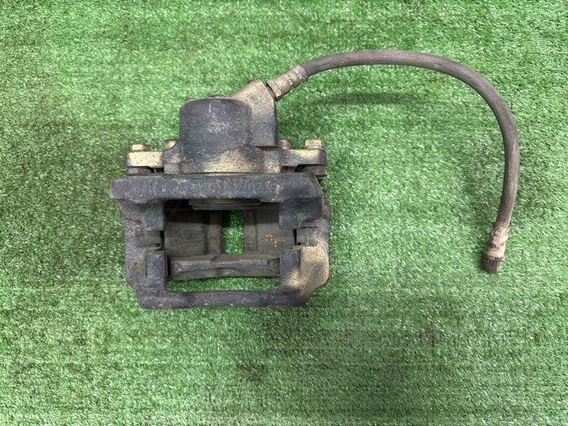 Суппорт тормозной Renault Logan