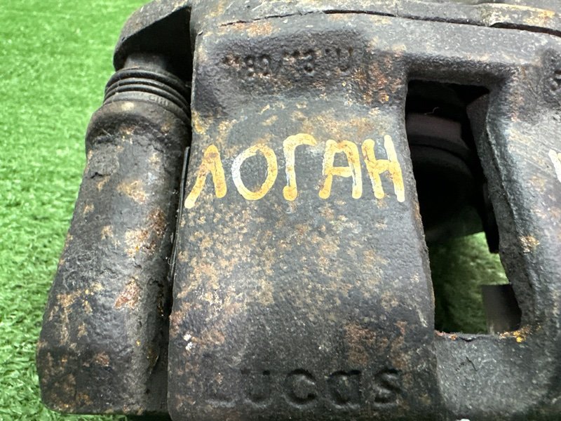 Суппорт тормозной Renault Logan