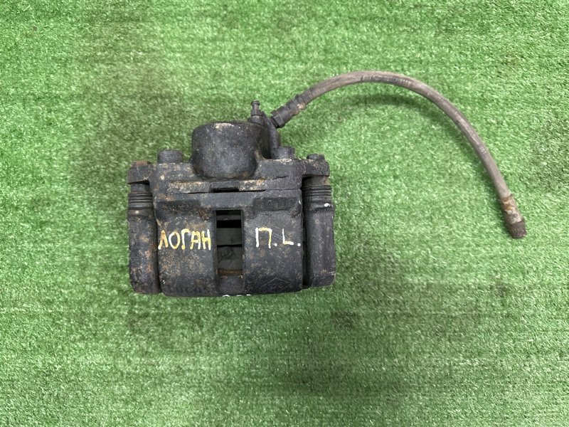 Суппорт тормозной Renault Logan