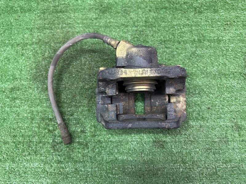 Суппорт тормозной Renault Logan