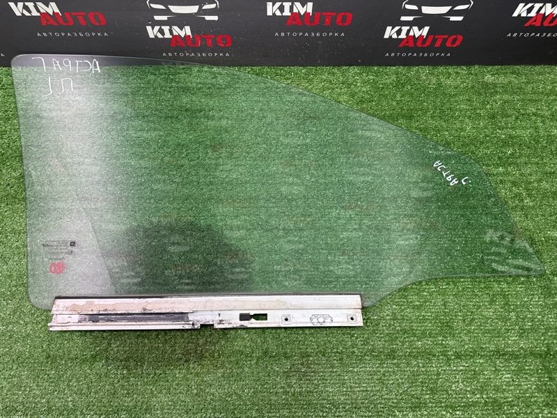 Стекло двери Opel Astra