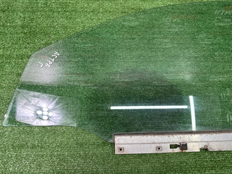 Стекло двери Opel Astra