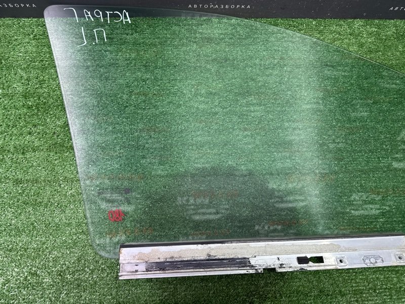 Стекло двери Opel Astra