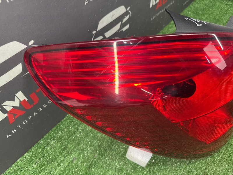 Фонарь Opel Corsa D