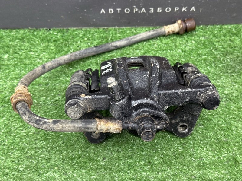 Суппорт тормозной Chevrolet Lacetti