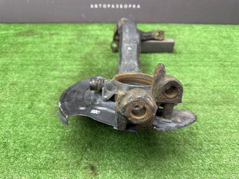 Кулак поворотный Volkswagen Passat B5
